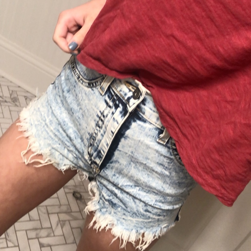 Distressed denim shorts